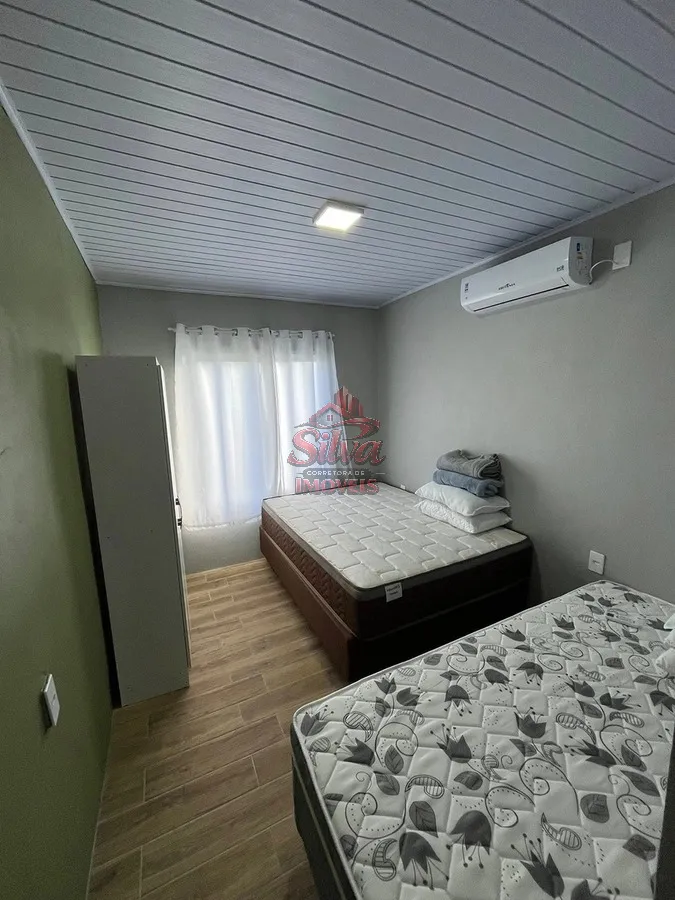 Imagem Casa 2 dormitórios com suíte a 580m do mar no Mariluz