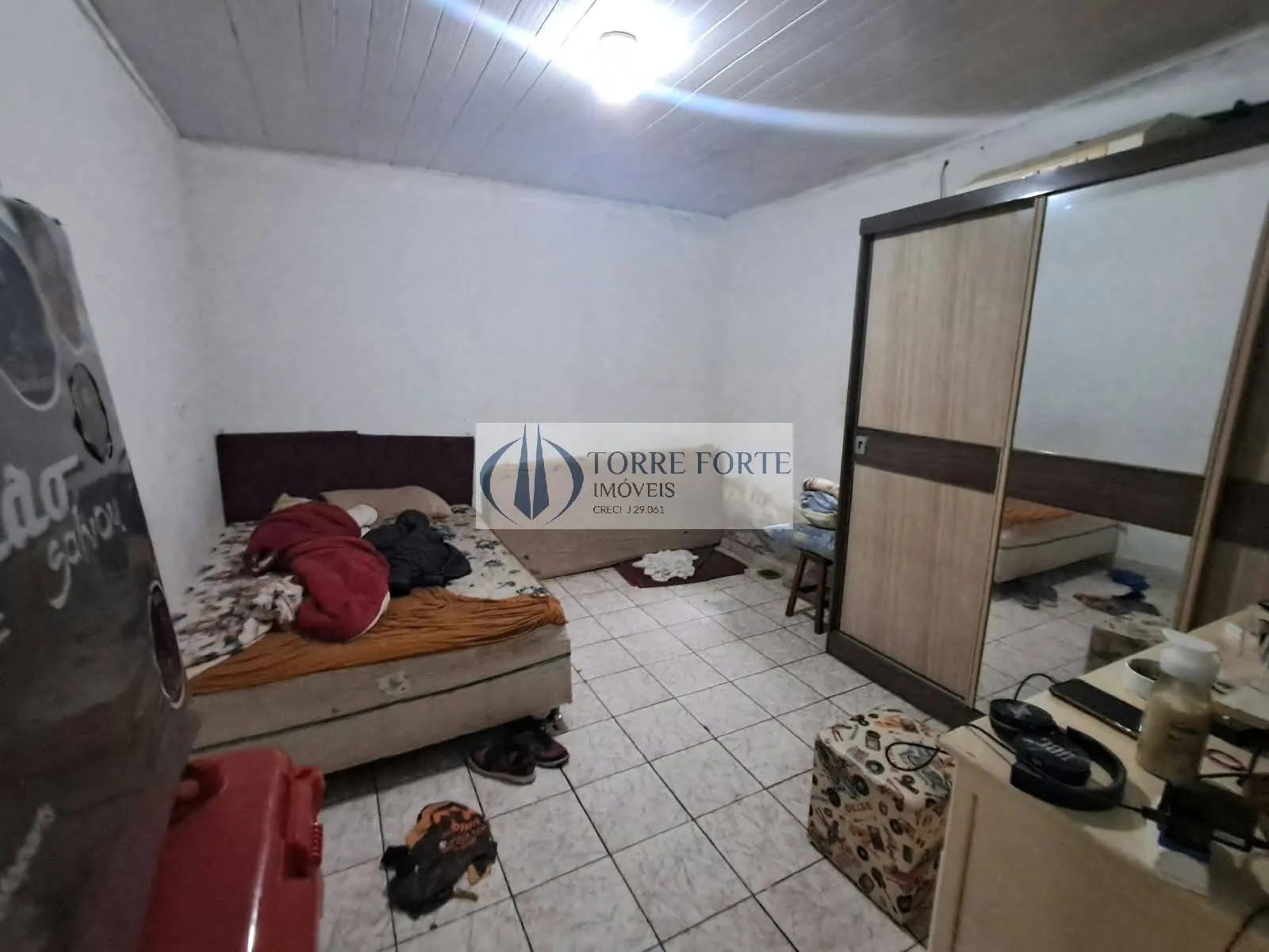 Imagem Terreno com 2 casas