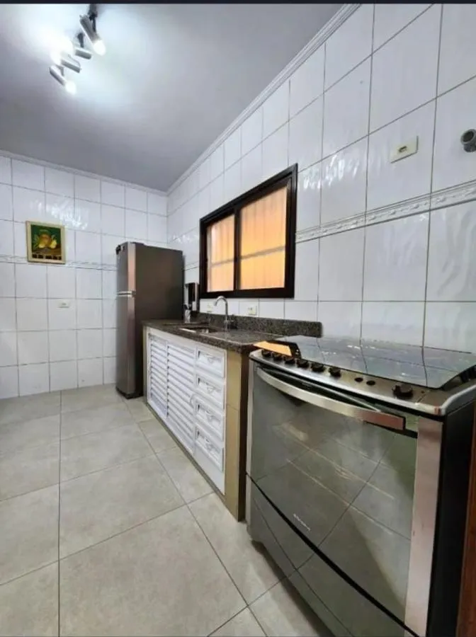Imagem Casa para Venda em Praia Grande, Guilhermina, 2 dormitórios, 2 suítes, 1 banheiro, 1 vaga