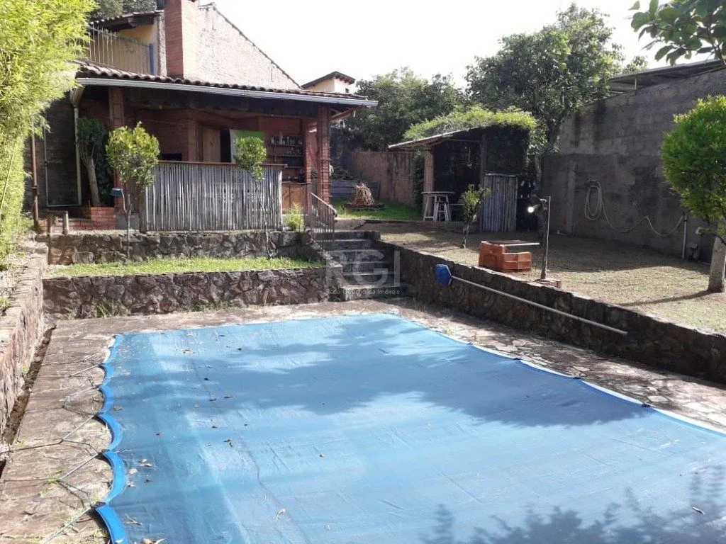 Imagem Casa para Venda - 311m², 4 dormitórios, sendo 2 suites, 4 vagas - Glória