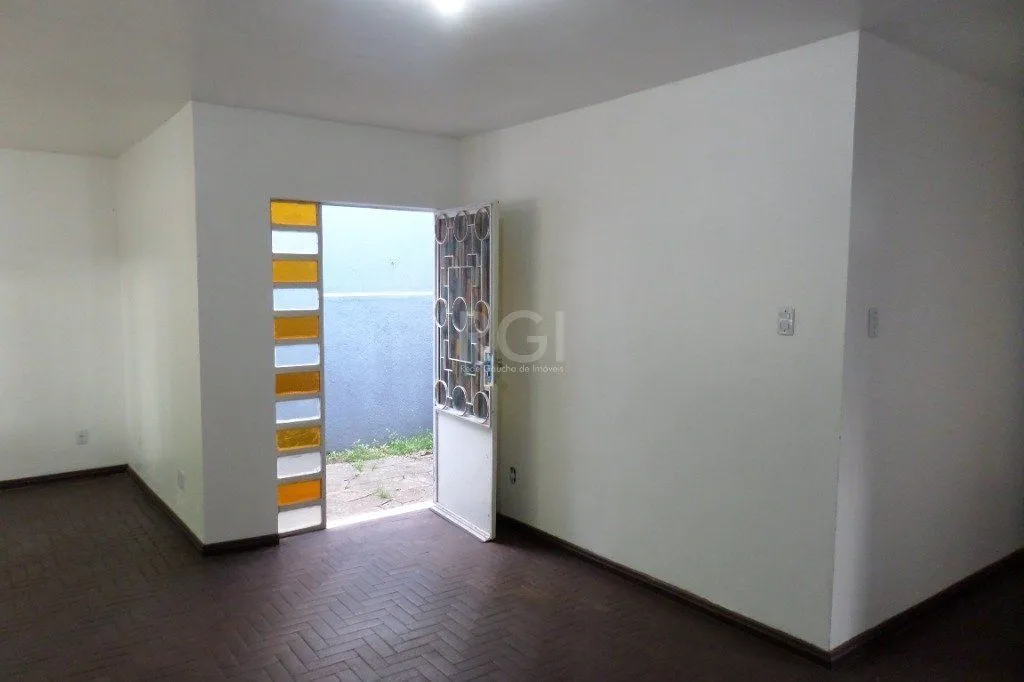 Imagem Casa no bairro Jardim Botânico de 3 dormitórios e 2 vagas