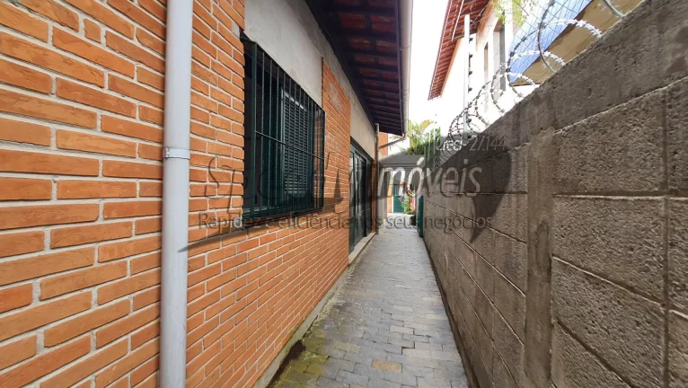 Imagem Sobrado 4 dormitórios no Guarujá, bairro Jardim Vigínia