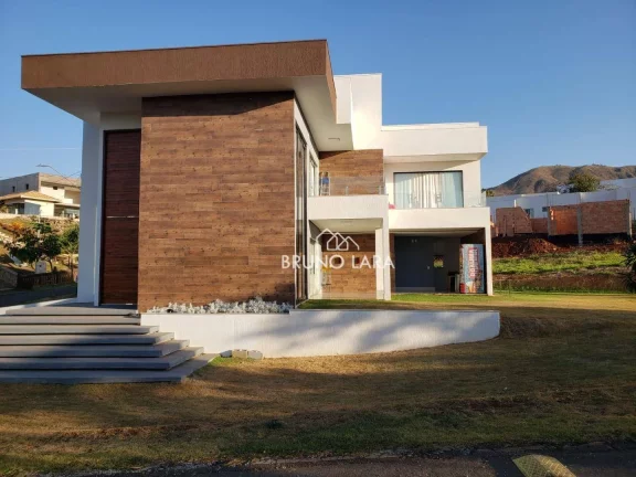 Imagem Casa à venda em Mário Campos Condomínio Serra dos Bandeirantes.