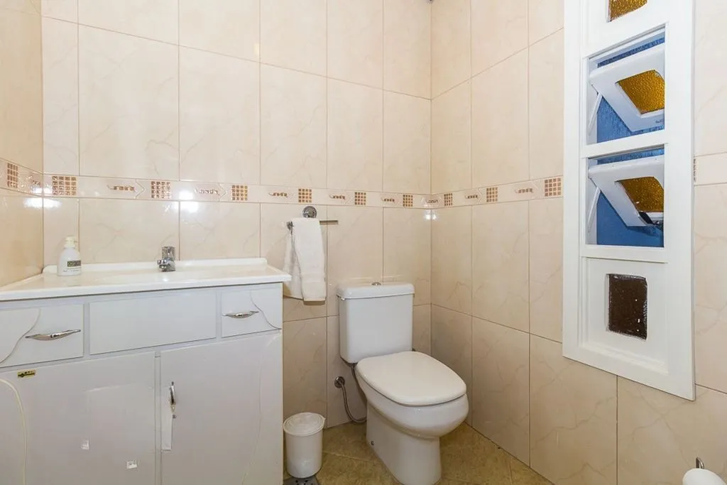 Imagem Casa de 4 dormitórios à venda no Bairro Ipanema - Porto Alegre