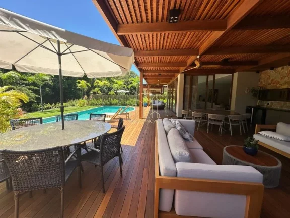 Imagem Com ambientes amplos e moderno essa casa decorada com quatro suítes e área gourmet a venda na Praia do Forte