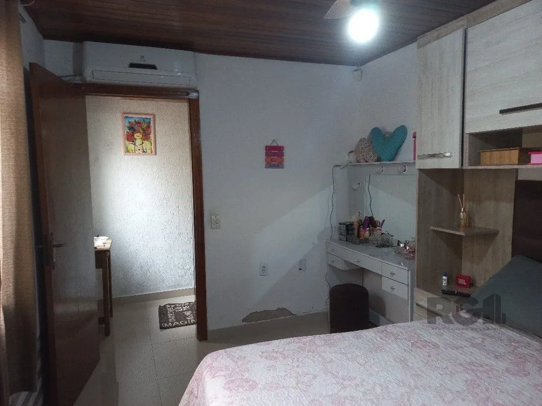 Imagem Casa 2 dormitórios com piscina na Vila Nova Porto Alegre