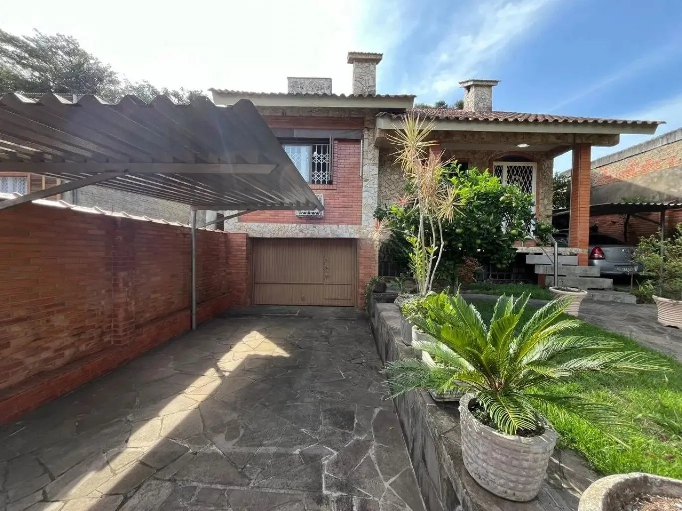 Imagem Casa com 4 quartos e 2 lareiras no bairro Belém Velho