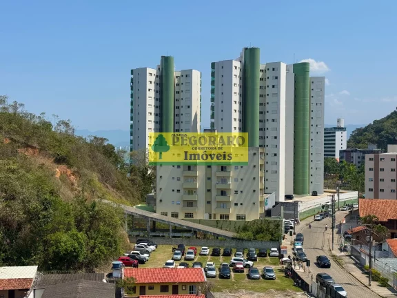 Imagem Apartamento de 2 quartos na Prainha, Caraguatatuba-SP 1 suíte, 2 salas, 2 banheiros, 1 vaga de garagem e vista para o mar