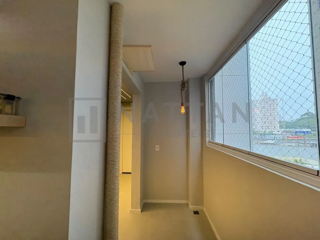 Imagem Apartamento com 2 dormitórios e suíte, 49,73 m², sacada e condomínio com piscina e academia