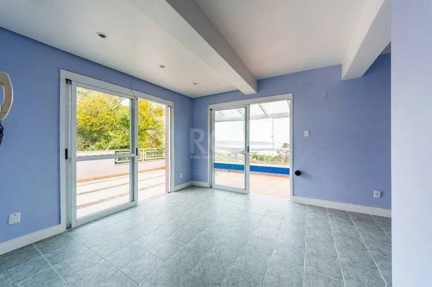 Imagem Casa à venda com 2 quartos, 255m² Rua CORONEL GOMES DE CARVALHO, Sétimo Céu, Porto Alegre
