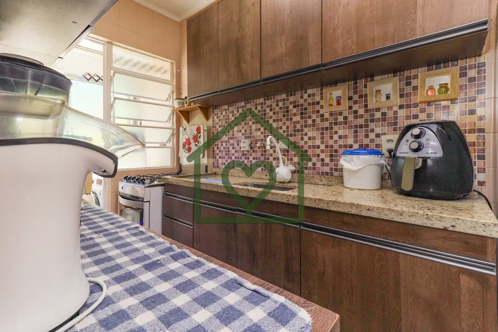 Imagem Apartamento no bairro Camaquã com 61m2 privativos, localizado a um lance de escada, composto por do...