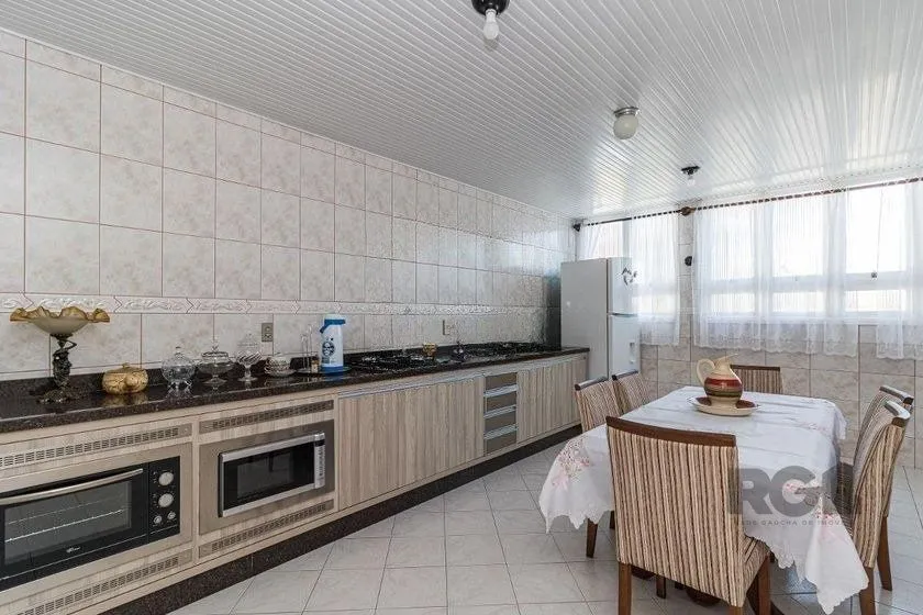 Imagem Casa Mista 266m² - 4 dormitórios, 1 suíte, 3 vagas no bairro Parque Santa Fé