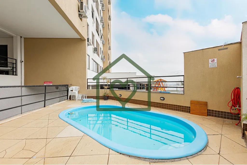 Imagem Apartamento Ã  venda em Porto Alegre, na Rua EugÃªnio Du Pasquier, bairro Cristo Redentor. Com 65 mÂ...