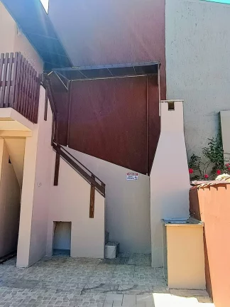 Imagem Oportunidade Única: Pousada Histórica à venda em Garopaba-SC, a 1 Quadra da Praia Central!