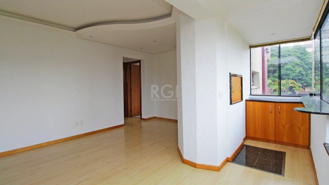 Imagem Apartamento de dois dormitórios e uma vaga de garagem na Rua Marcelo Gama, bairro Auxiliadora em Porto Alegre.