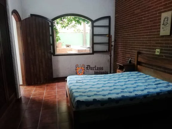Imagem Casa com 4 dormitórios à venda, 160 m² por R$ 1.000.000 - Balneário Praia do Pernambuco - Guarujá/SP