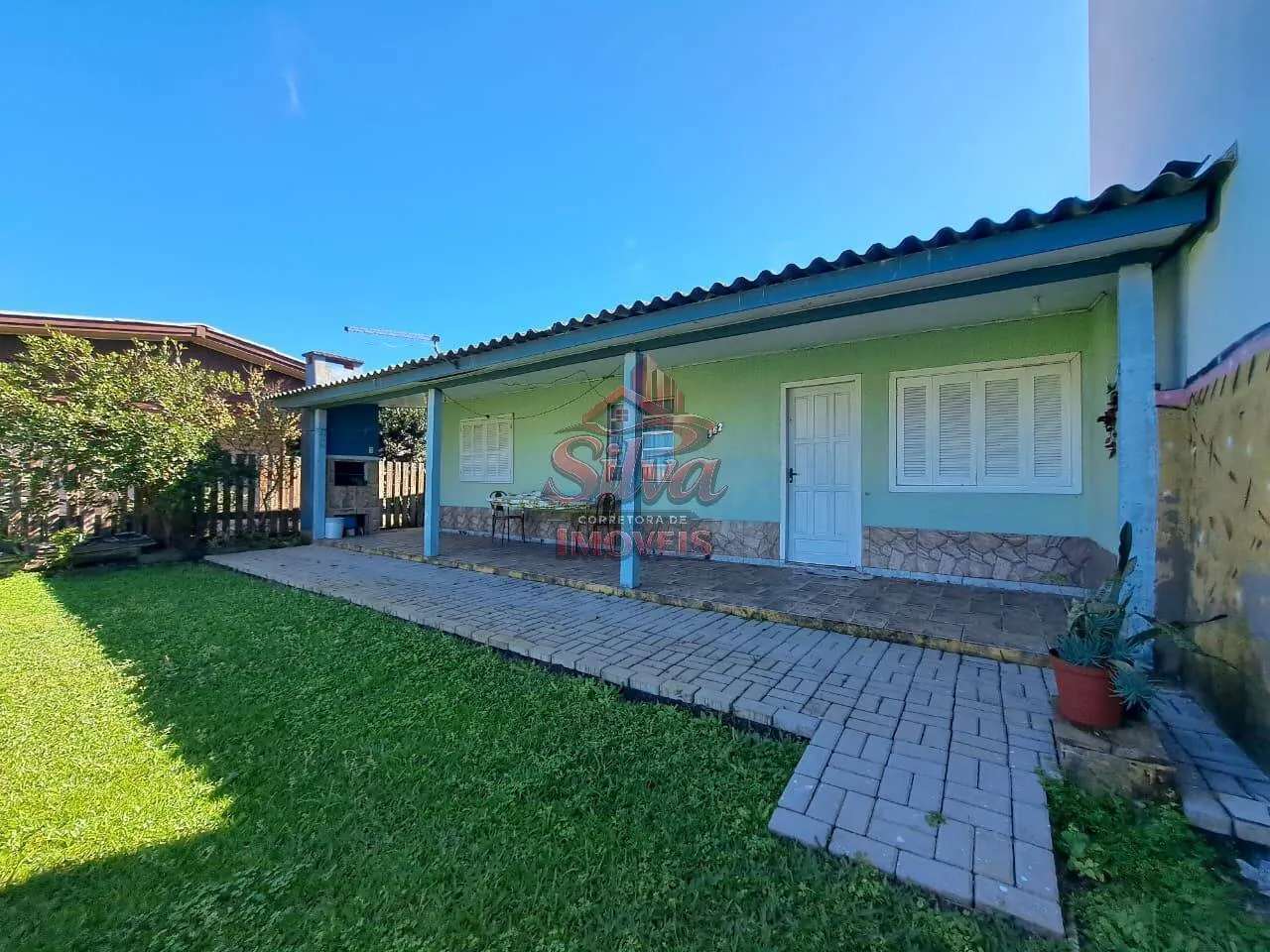 Casa 2 dormitórios com suíte a 300m do mar no Mariluz