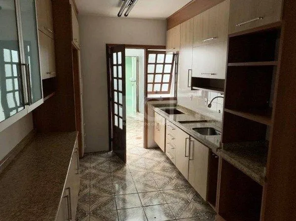 Imagem Casa no bairro Jardim Botânico de 3 dormitórios