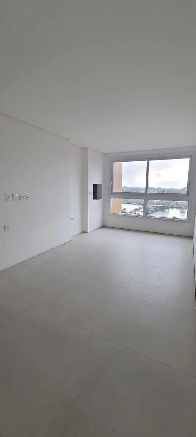 Imagem Apartamento à venda em Torres, Predial, com 1 quarto, 61.01m2
