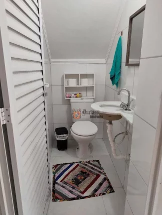 Imagem Sobrado com 2 dormitórios à venda, 59 m² por R$ 399.000 - Aviação - Praia Grande/SP
