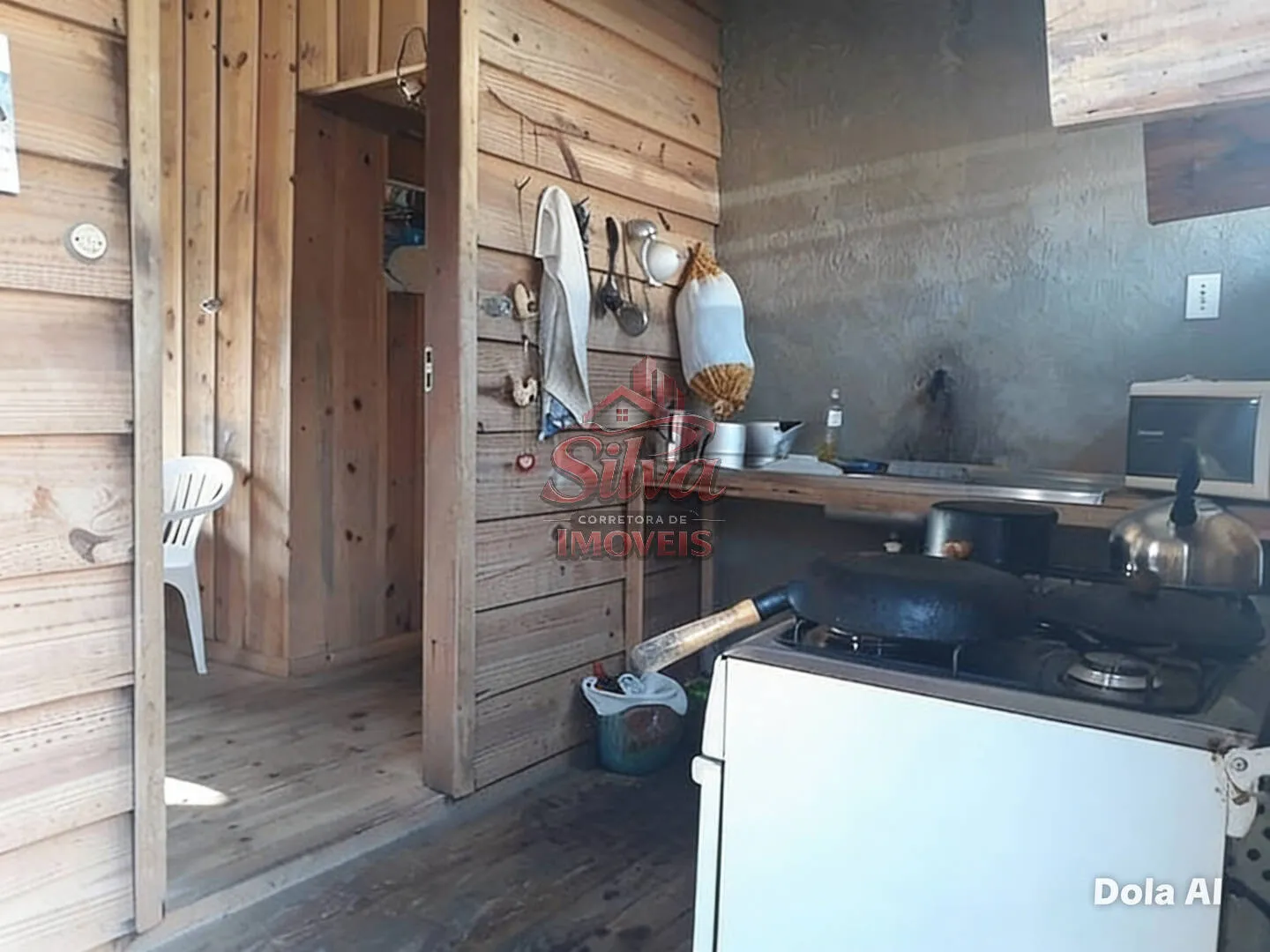 Imagem C1065 | Casa de madeira 1 dormitório à venda em Imbé