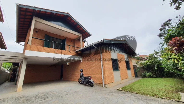 Imagem Sobrado 4 dormitórios no Guarujá, bairro Jardim Vigínia