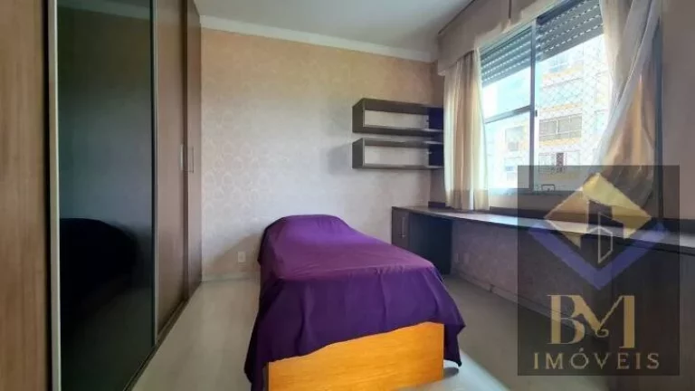 Imagem APARTAMENTO NO BOQUEIRÃO FRENTE MAR COM VARANDA E PORTEIRA F