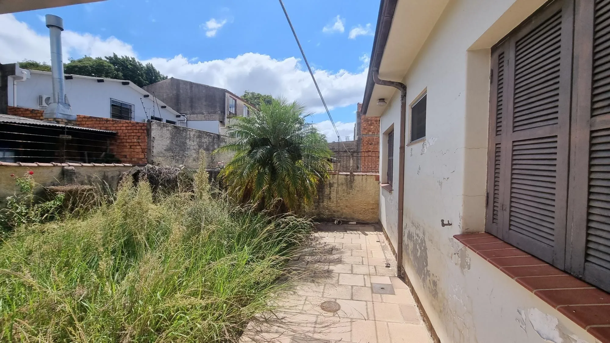 Imagem Casa com loja na frente a venda no Bairro Anchieta.