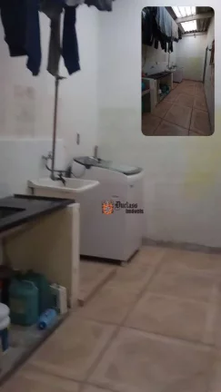 Imagem Casa com 2 dormitórios à venda, 64 m² por R$ 390.000 - Vila Caiçara - Praia Grande/SP