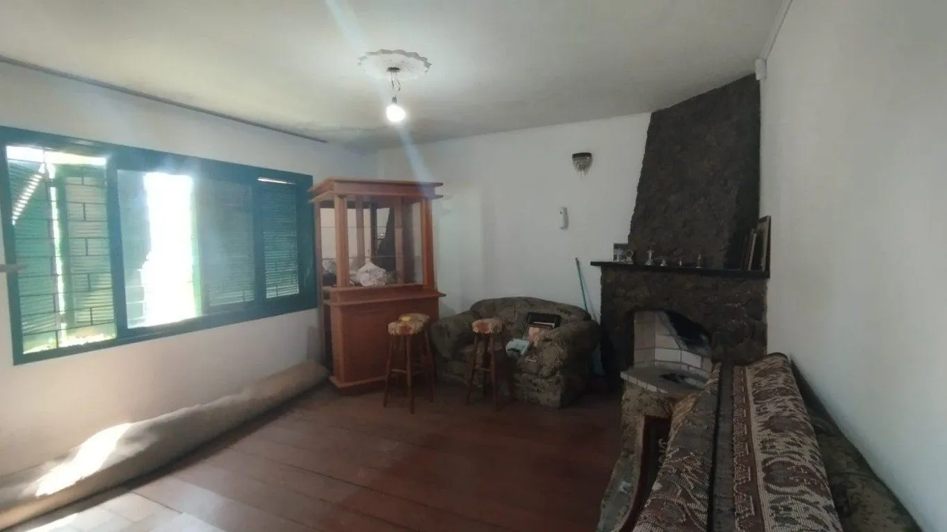 Imagem Casa com 4 quartos e 257m² à venda em Guarujá, Porto Alegre.