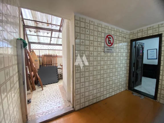 Imagem Sobrado com 4 dormitórios à venda em Santos/SP
