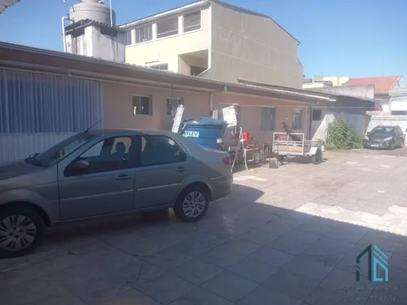 Imagem Casa a venda c/ loja no mesmo terreno a venda no Uberaba em Curitiba Pr