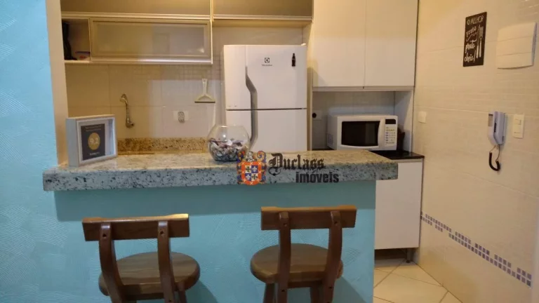 Imagem Apartamento com 1 dormitório à venda, 47 m² por R$ 299.000 - Caiçara - Praia Grande/SP