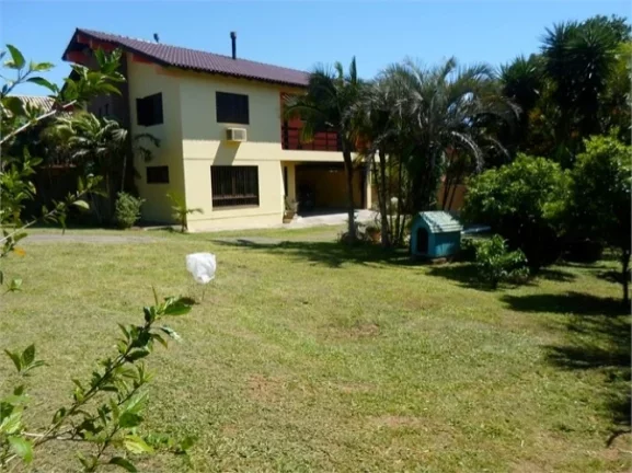 Imagem Belíssimo Sobrado em condomínio fechado, Centro de Águas Claras / Viamão