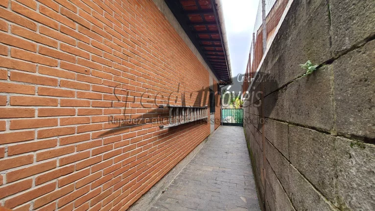 Imagem Sobrado 4 dormitórios no Guarujá, bairro Jardim Vigínia