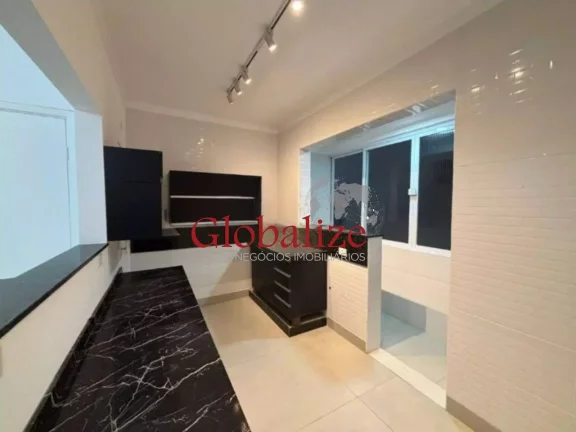 Imagem Apartamento à venda com 70m², 2 quartos, cozinha americana, 1 vaga por R$430.000 no Gonzaga em Santos
