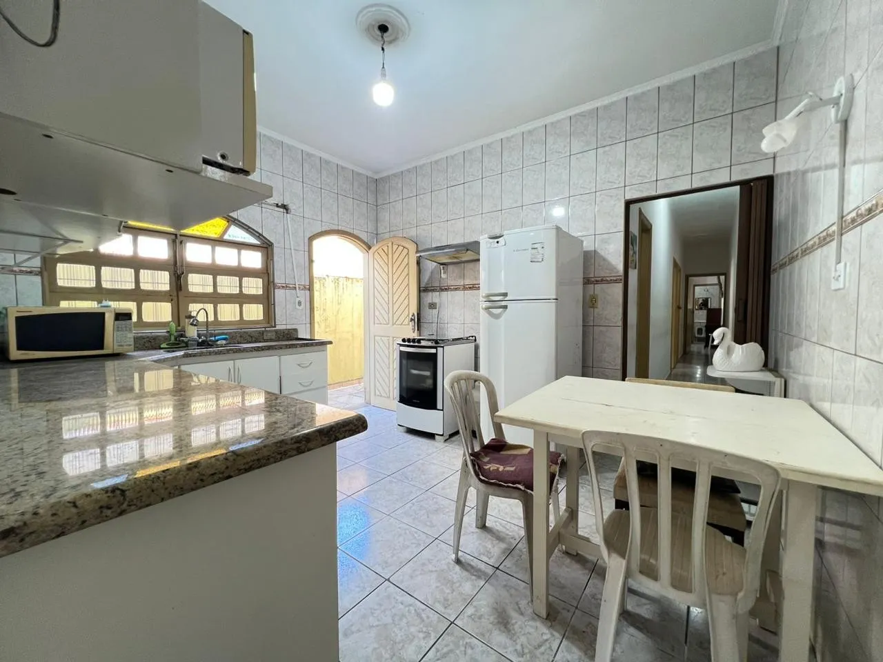 Imagem Casa para Venda em Praia Grande, Caiçara, 3 dormitórios, 1 suíte, 1 banheiro, 2 vagas
