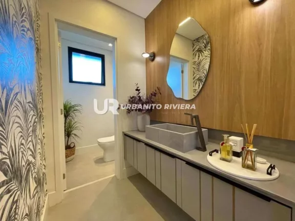 Imagem Casa de alto padrão na Riviera com design refinado e piscina com spa
