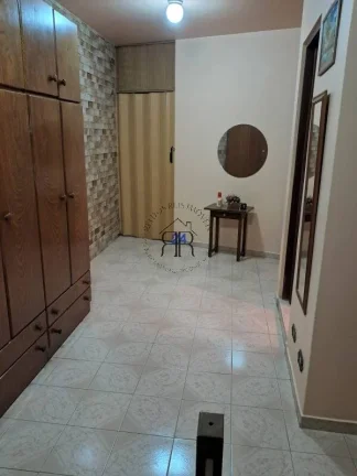 Imagem Sobrado com dois dormitórios sendo um suíte, área gourmet, sala e cozinha grandes, móveis planej...