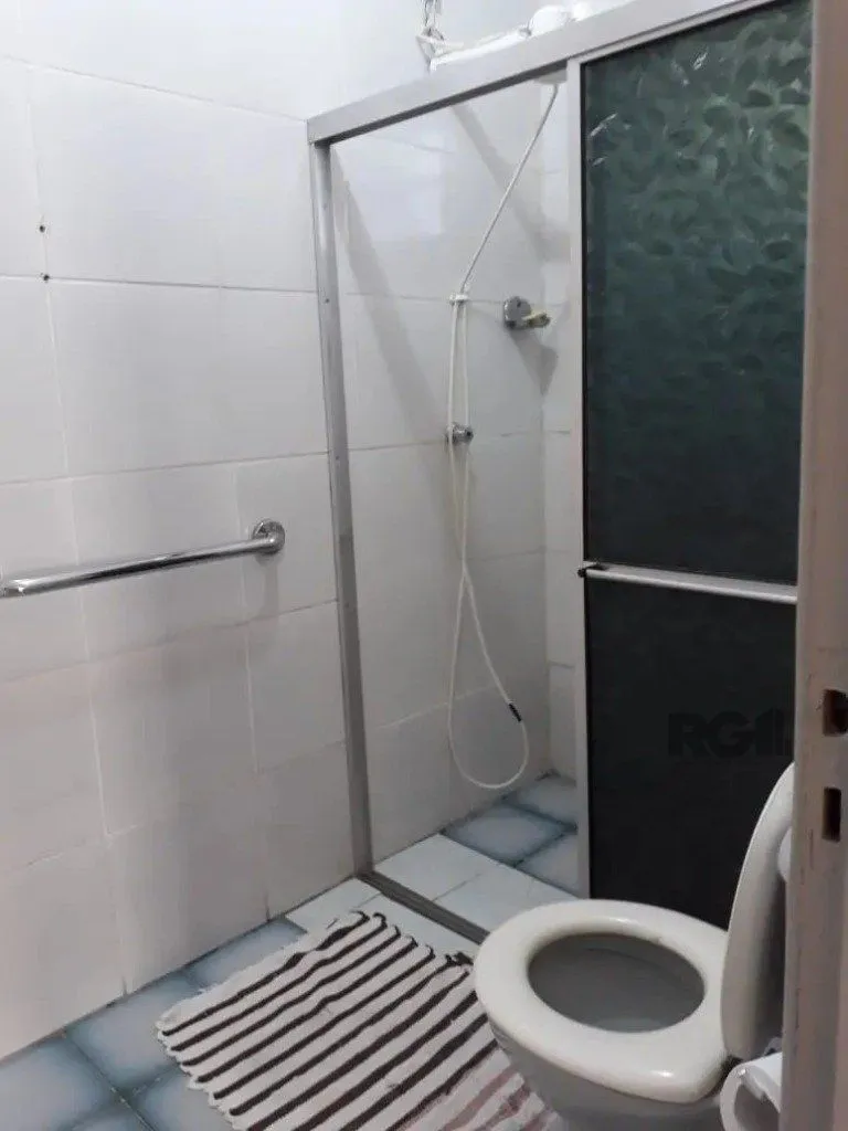 Imagem Casa com 5 dormitórios no bairro Passo das Pedras - Porto Alegre