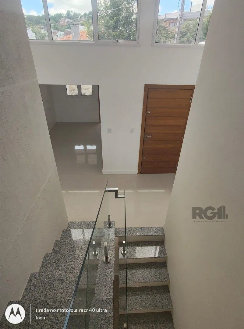 Imagem Casa em Condomínio fechado com 3 dormitórios no bairro Vila Nova em Porto Alegre, RS