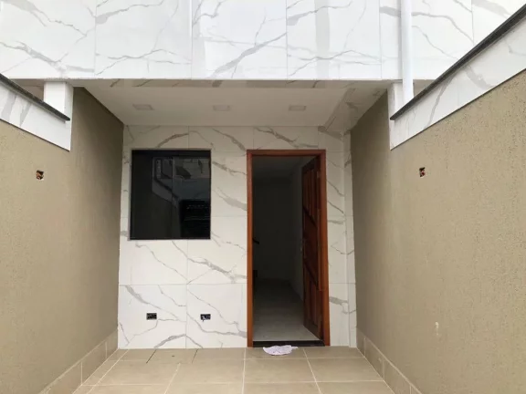 Imagem Sobrado com 2 dormitórios à venda, 60 m² por R$ 390.000,00 - Caiçara - Praia Grande/SP