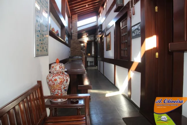 Imagem Linda Casa 03 Dormitorios ( sendo 01) + Edícula - 300 Metros de Terreno 50 Metros da Praia