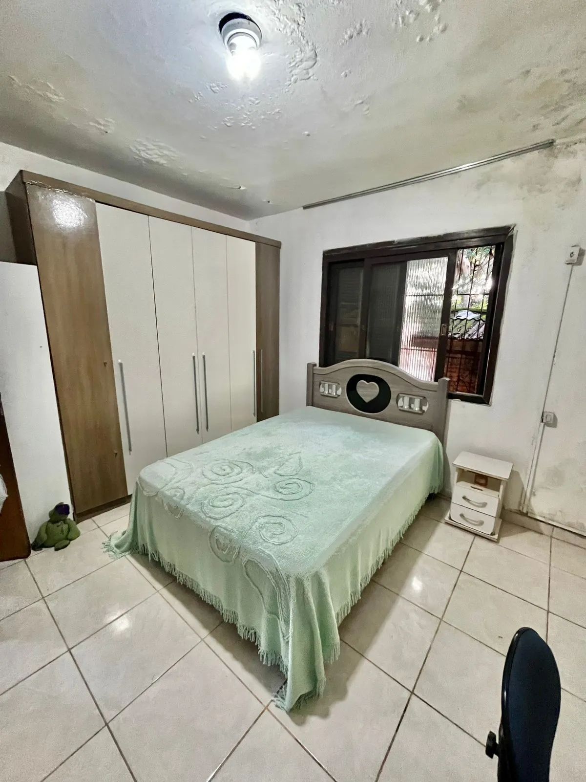 Imagem Casa na Rua Marista, Partenon, com 11,00 de frente por 23,00 de frente a fundos