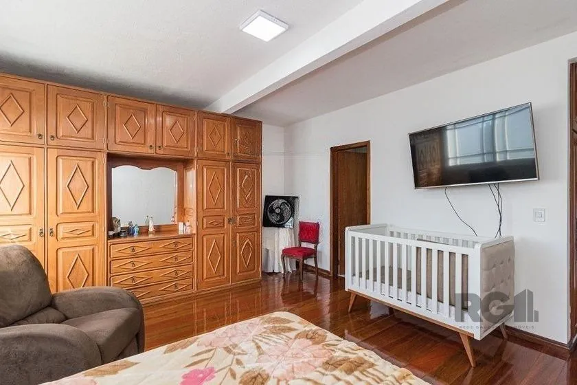 Imagem Casa Mista 266m² - 4 dormitórios, 1 suíte, 3 vagas no bairro Parque Santa Fé