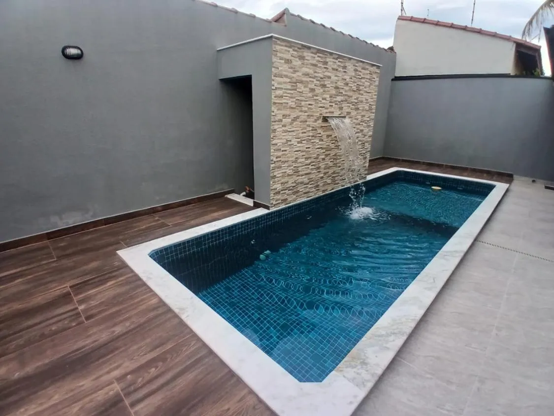 Imagem CASA NOVA COM PISCINA A 119 METROS DO MAR NO REGINA MARIA ITANHAÉM