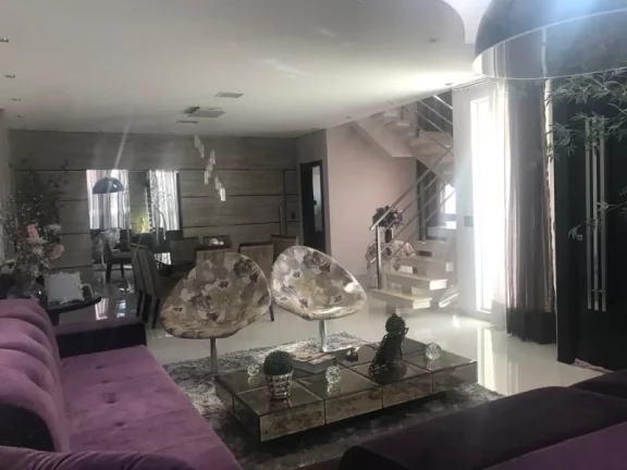 Imagem CASA COM 4 SUÍTES NA RUA 01 JOCKEY, CONDOMÍNIO FECHADO COM PORTARIA 24 HORAS, LOTE QUITADO E ESCRITURADO