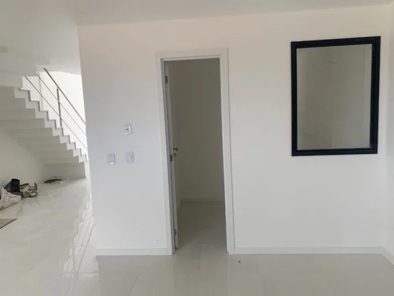 Imagem Casa Triplex com 3 quartos sendo uma suíte duas vagas de garagem área gourmet na Enseada Azul