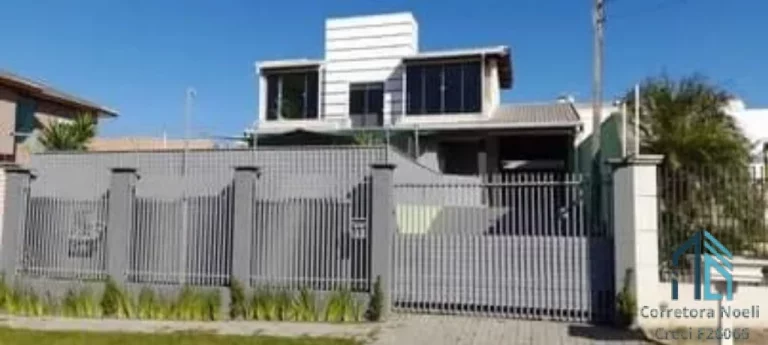 Imagem Sobrado com edícula, 05 quartos sendo duas suítes à venda no Atuba, divisa com Tingui, próximo ao Bacacheri em Curitiba PR