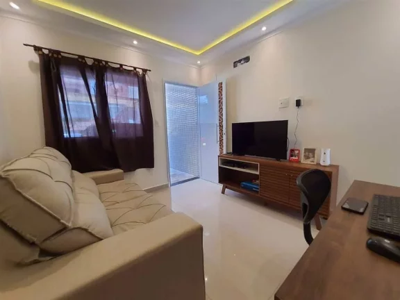 Imagem Casa com 2 dormitórios à venda, 70 m² por R$ 398.000 - Caiçara - Praia Grande/SP